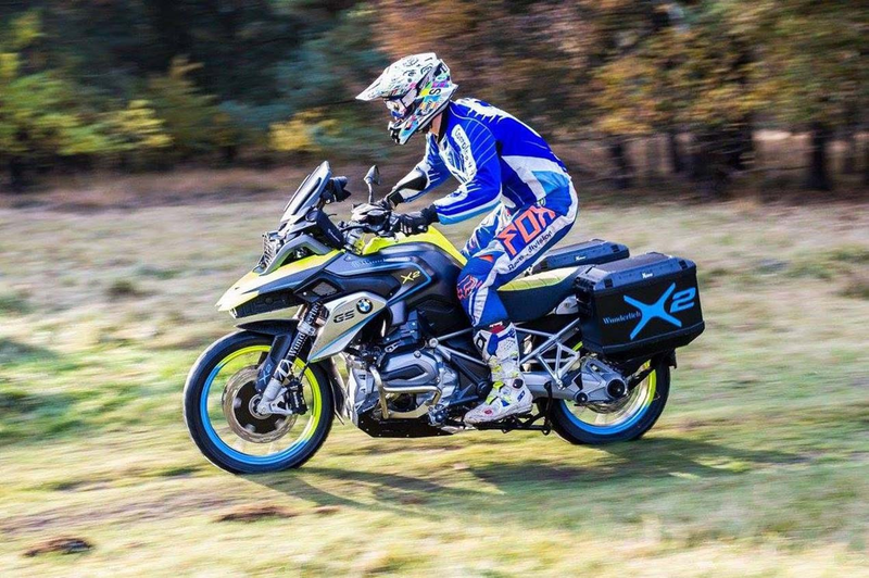 Illustration for article titled This Company Will Build You A Kickass Hybrid Two-Wheel Drive BMW Adventure Bike